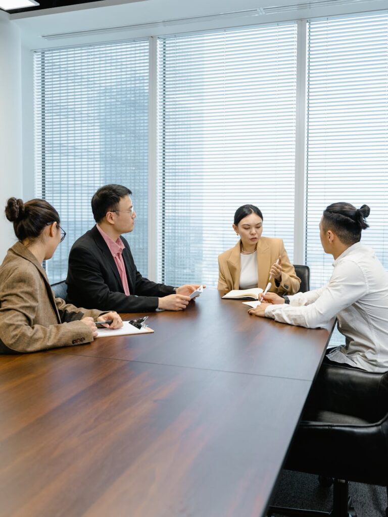 people having a meeting at the conference room