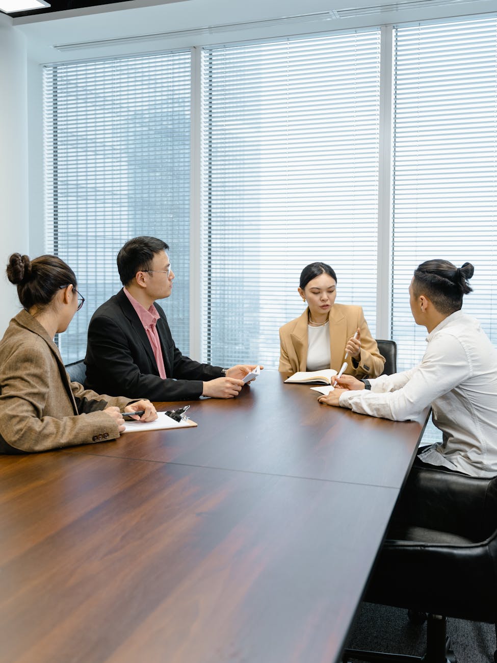 people having a meeting at the conference room